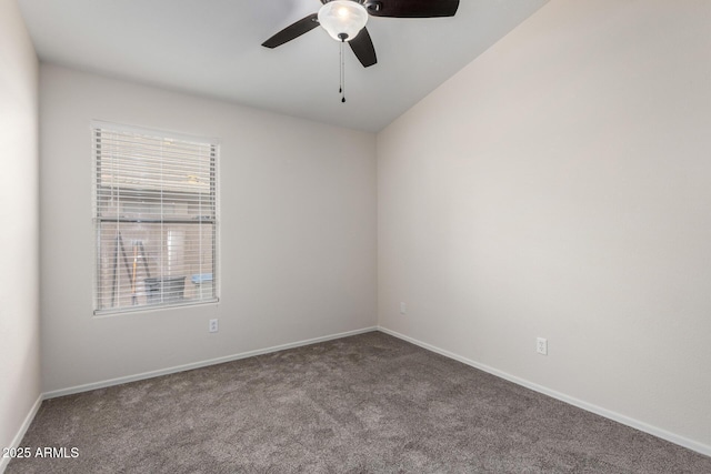 empty room with carpet, baseboards, and ceiling fan