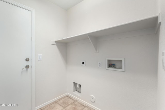 clothes washing area with gas dryer hookup, light tile patterned floors, laundry area, hookup for a washing machine, and hookup for an electric dryer