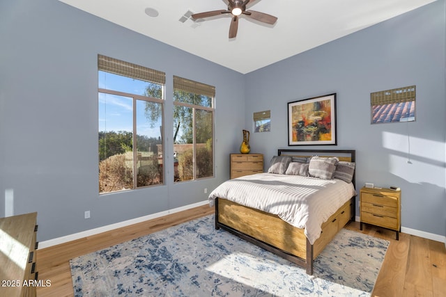 bedroom featuring ceiling fan and wood-type flooring