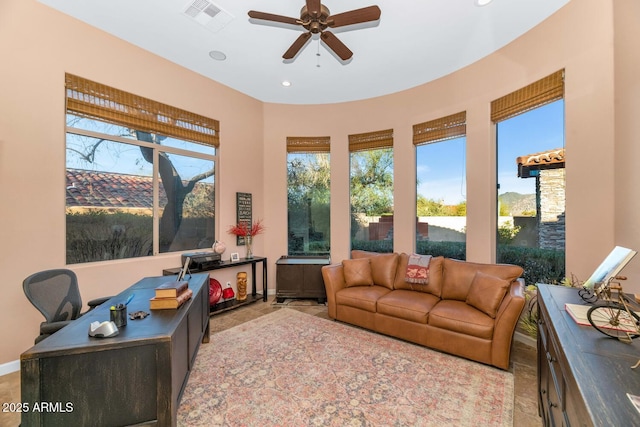 living room featuring ceiling fan