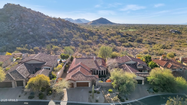 drone / aerial view featuring a mountain view