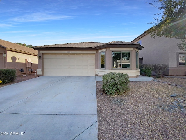 view of front of home with a garage