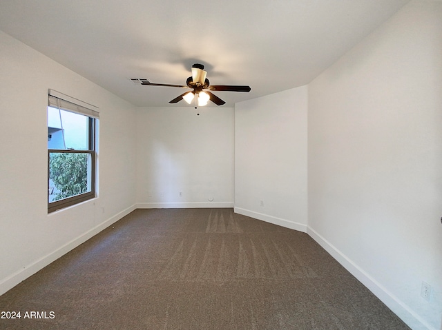 carpeted empty room with ceiling fan