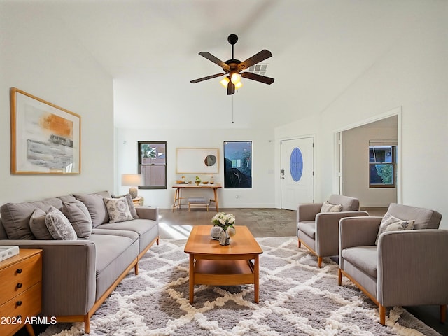 living room featuring high vaulted ceiling and ceiling fan