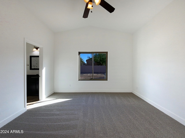 empty room with carpet floors, ceiling fan, and vaulted ceiling