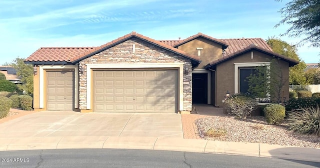 view of front of home featuring a garage