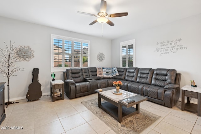 tiled living room featuring a wealth of natural light and ceiling fan