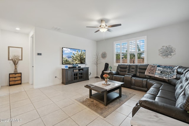 tiled living room featuring ceiling fan