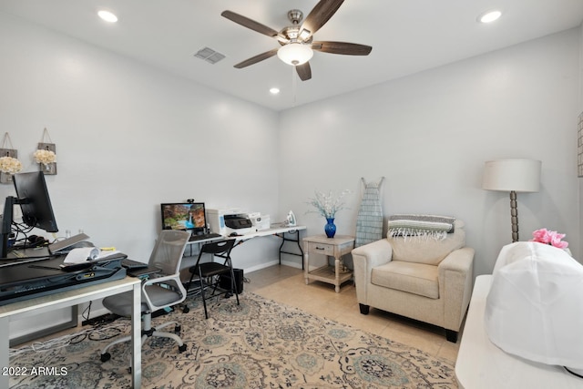 office space with ceiling fan and light tile patterned flooring