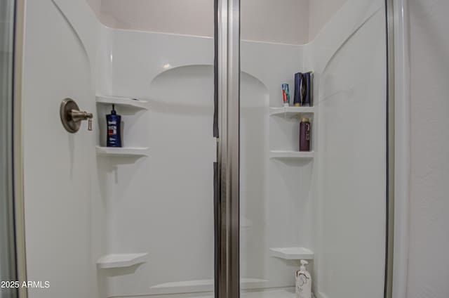 bathroom featuring a stall shower