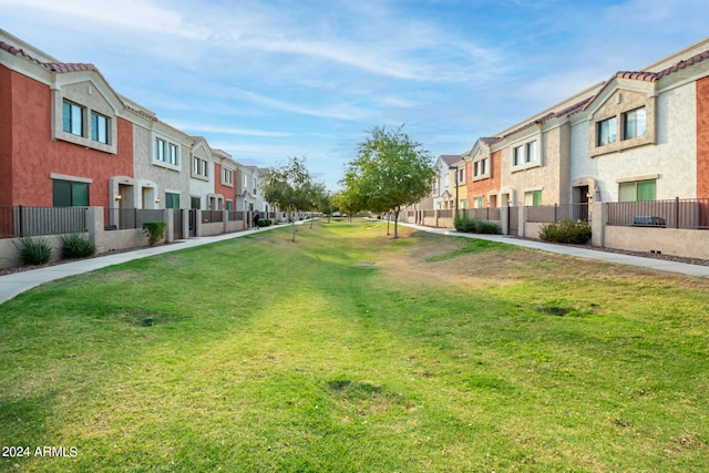 surrounding community with a lawn