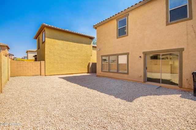 back of house featuring a patio area