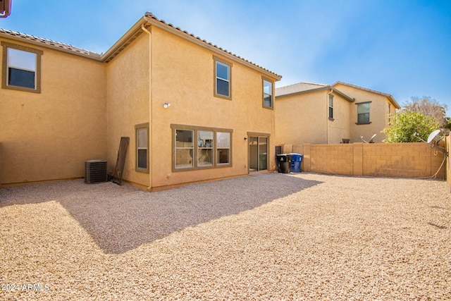 rear view of property featuring a patio