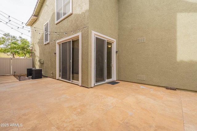 exterior space featuring a patio area and cooling unit