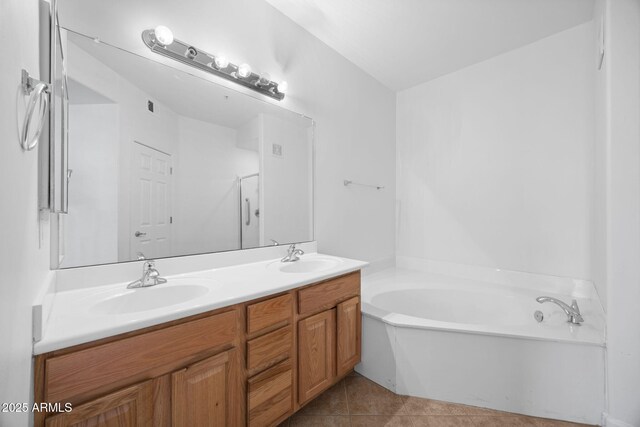 14000 N 94th St Unit 3198, Scottsdale, AZ 85260 - bathroom with double vanity, a garden tub, and tile patterned floors