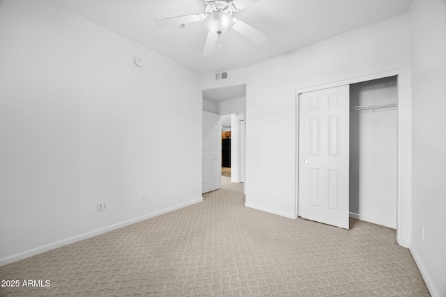14000 N 94th St Unit 3198, Scottsdale, AZ 85260 - unfurnished bedroom with light carpet, a closet, and ceiling fan