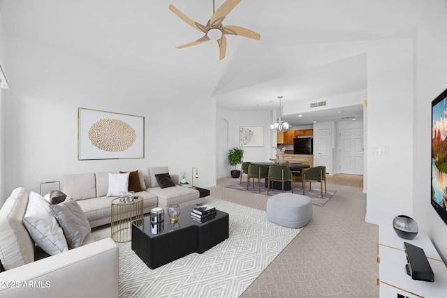 14000 N 94th St Unit 3198, Scottsdale, AZ 85260 - living room with a chandelier, ceiling fan, light colored carpet, arched walkways, and recessed lighting