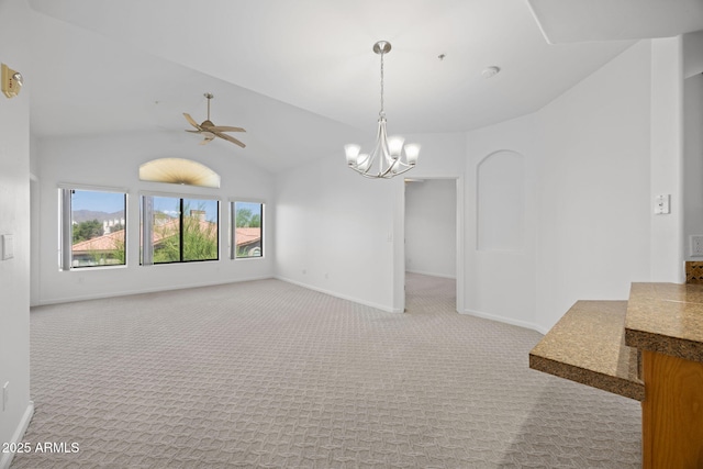 14000 N 94th St Unit 3198, Scottsdale, AZ 85260 - empty room featuring light carpet, vaulted ceiling, ceiling fan, and a chandelier