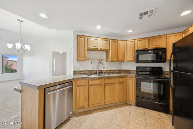 14000 N 94th St Unit 3198, Scottsdale, AZ 85260 - kitchen with black appliances, tile countertops, a chandelier, recessed lighting, and decorative light fixtures