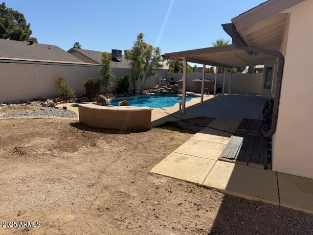 17371 N 86th Ave, Peoria, AZ 85382 - view of swimming pool featuring a fenced backyard and a patio