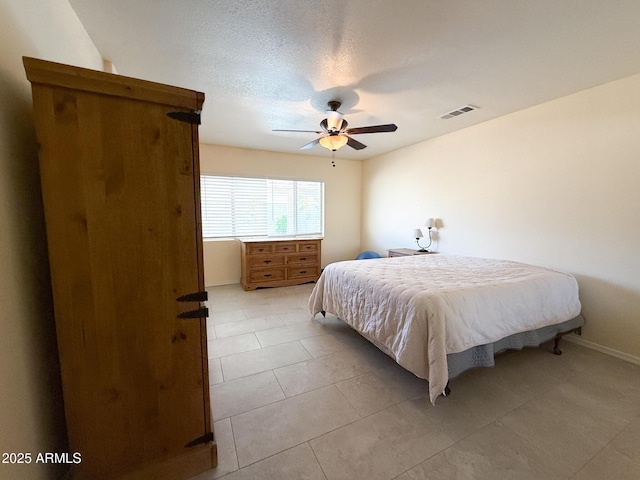 17371 N 86th Ave, Peoria, AZ 85382 - bedroom featuring baseboards, a ceiling fan, and light tile patterned floors