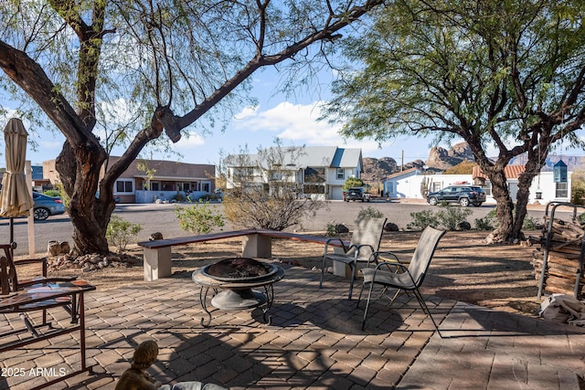 view of patio featuring a fire pit