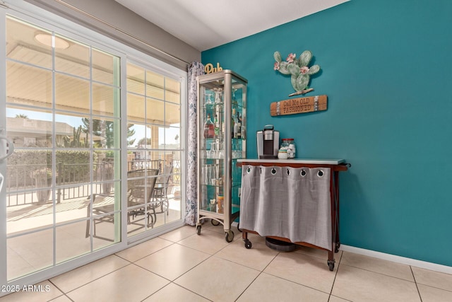 doorway featuring tile patterned floors