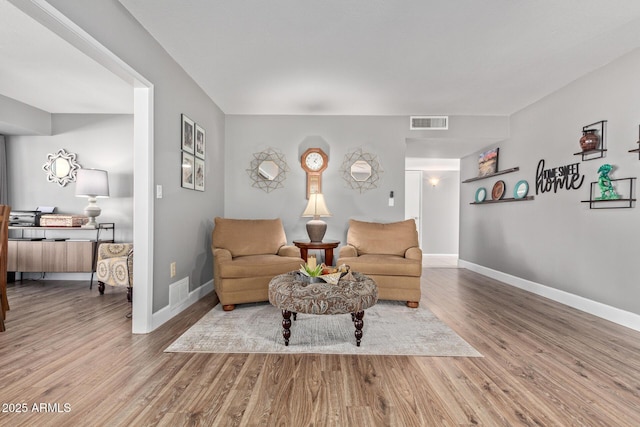 living room with hardwood / wood-style floors