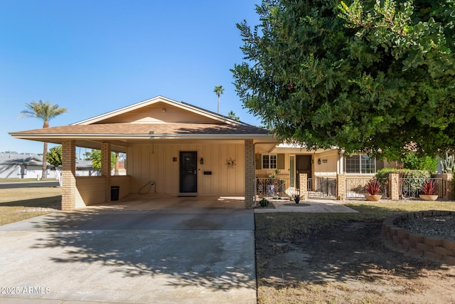 view of front facade with a carport