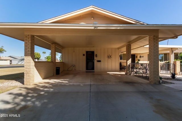 view of front of property with a carport