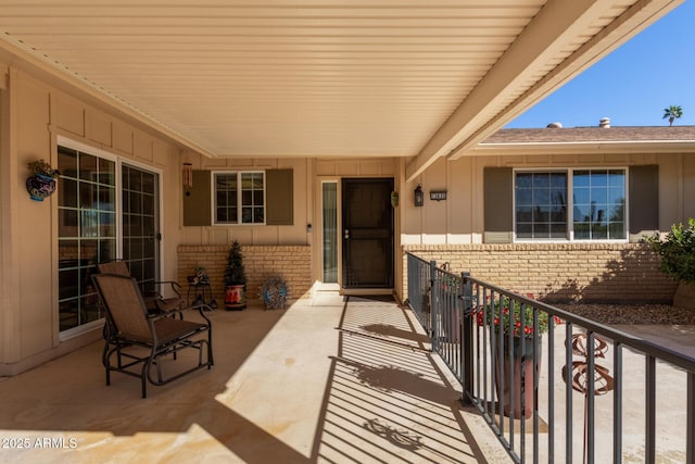 doorway to property featuring a balcony