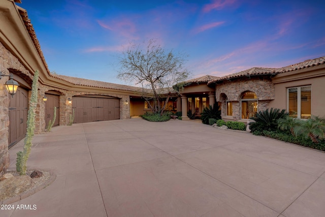 view of front of home with a garage