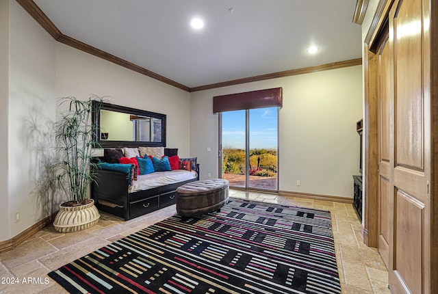 sitting room with crown molding and light tile floors