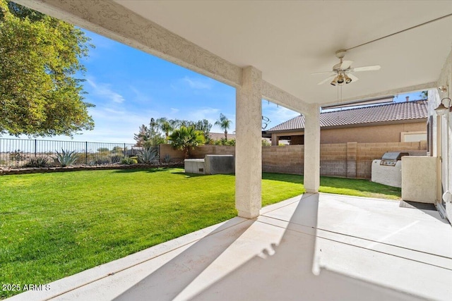 view of patio with ceiling fan and exterior kitchen