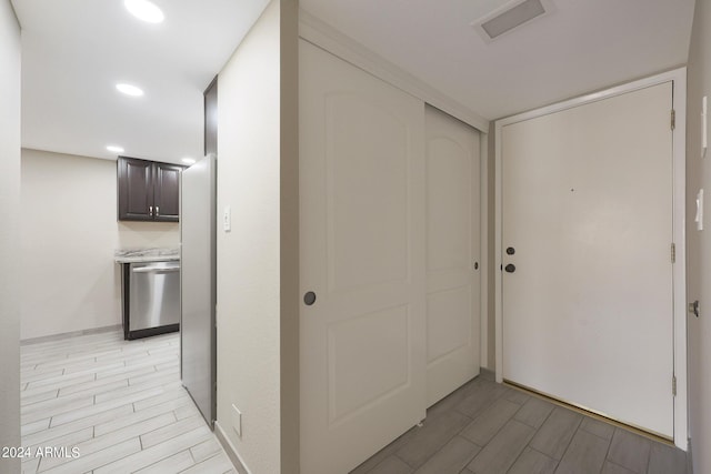 hall featuring recessed lighting and wood finish floors