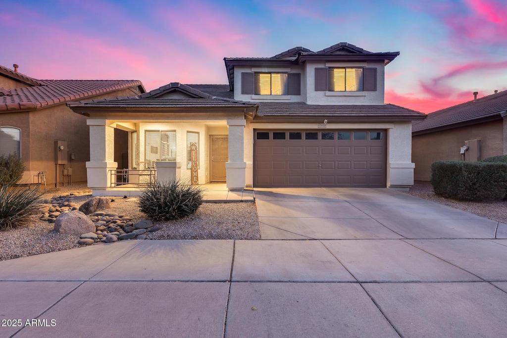 view of front of property featuring a garage