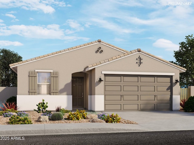 mediterranean / spanish home with stucco siding, a garage, concrete driveway, and a tiled roof