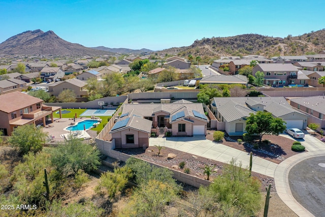 bird's eye view with a residential view and a mountain view