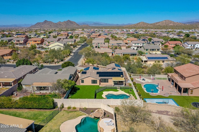 bird's eye view featuring a mountain view and a residential view