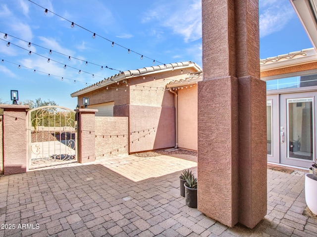 view of patio / terrace featuring a gate