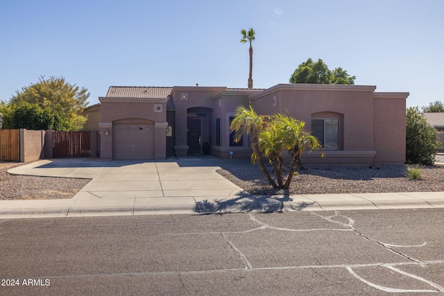 view of front of home with a garage