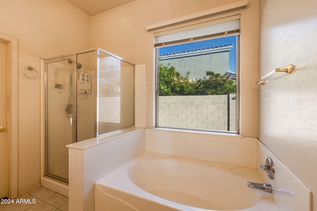 bathroom featuring tile patterned floors and plus walk in shower