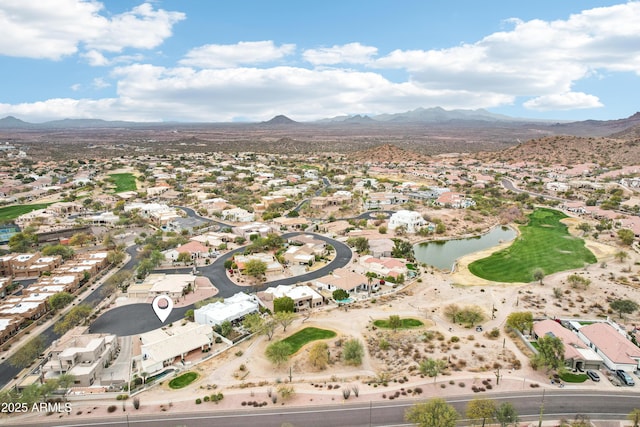 bird's eye view featuring a residential view and a water and mountain view