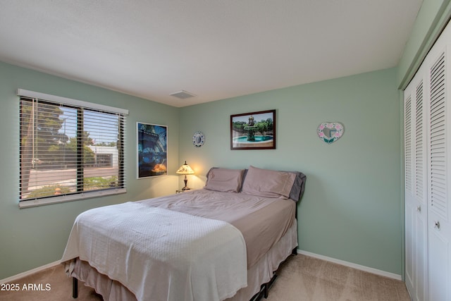 1326 W Joan De Arc Ave, Phoenix, AZ 85029 - bedroom featuring carpet floors and a closet