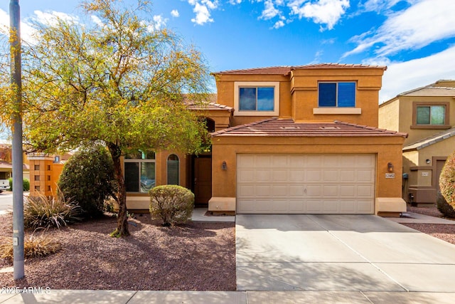 view of front of house featuring stucco siding, concrete driveway, and a tiled roof