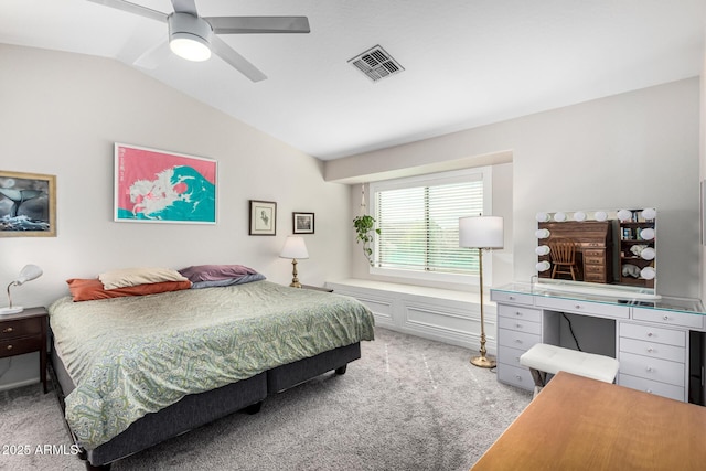 bedroom featuring visible vents, carpet, a ceiling fan, and vaulted ceiling