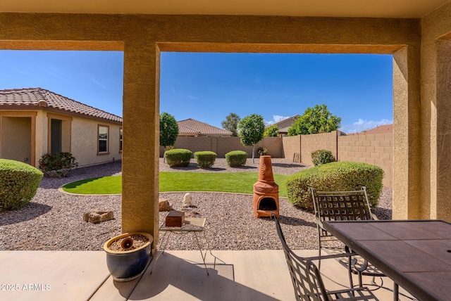 view of patio / terrace with outdoor dining area and a fenced backyard