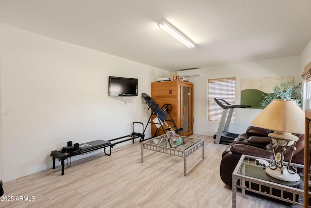 workout area with an AC wall unit