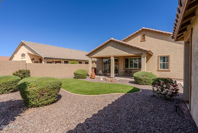 view of yard featuring fence and a patio area
