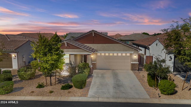 view of front of property with a garage